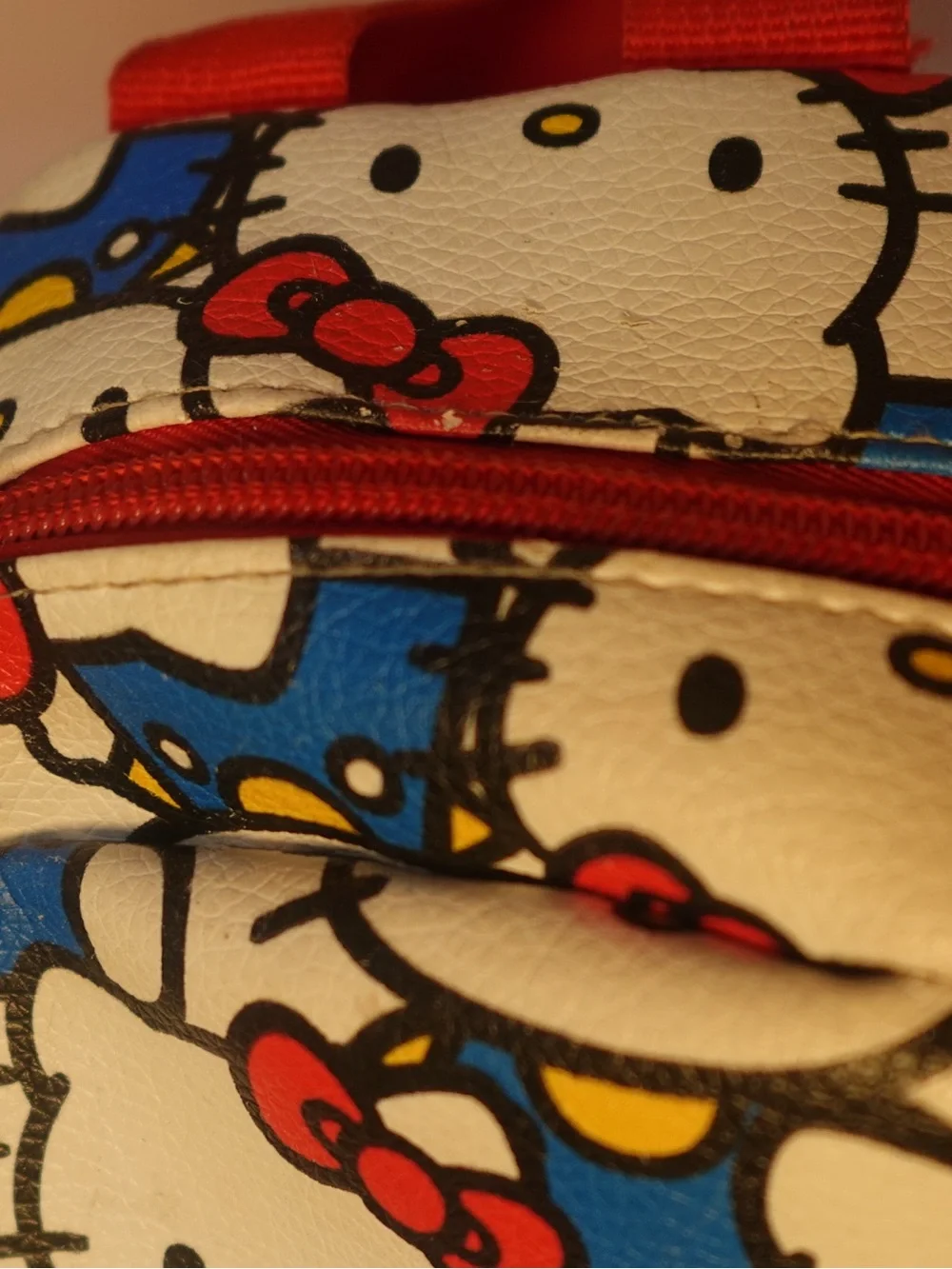 Hello Kitty White Backpack with Red Bows and Blue Outfits